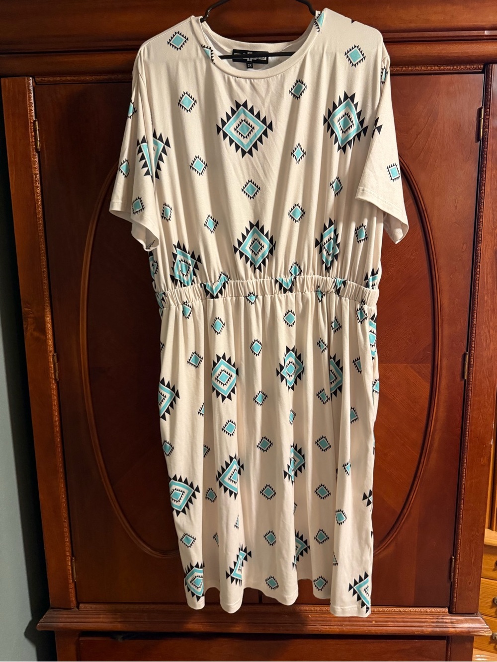 Rowdy Crowd Cream Tunic with Turquoise Aztec Print